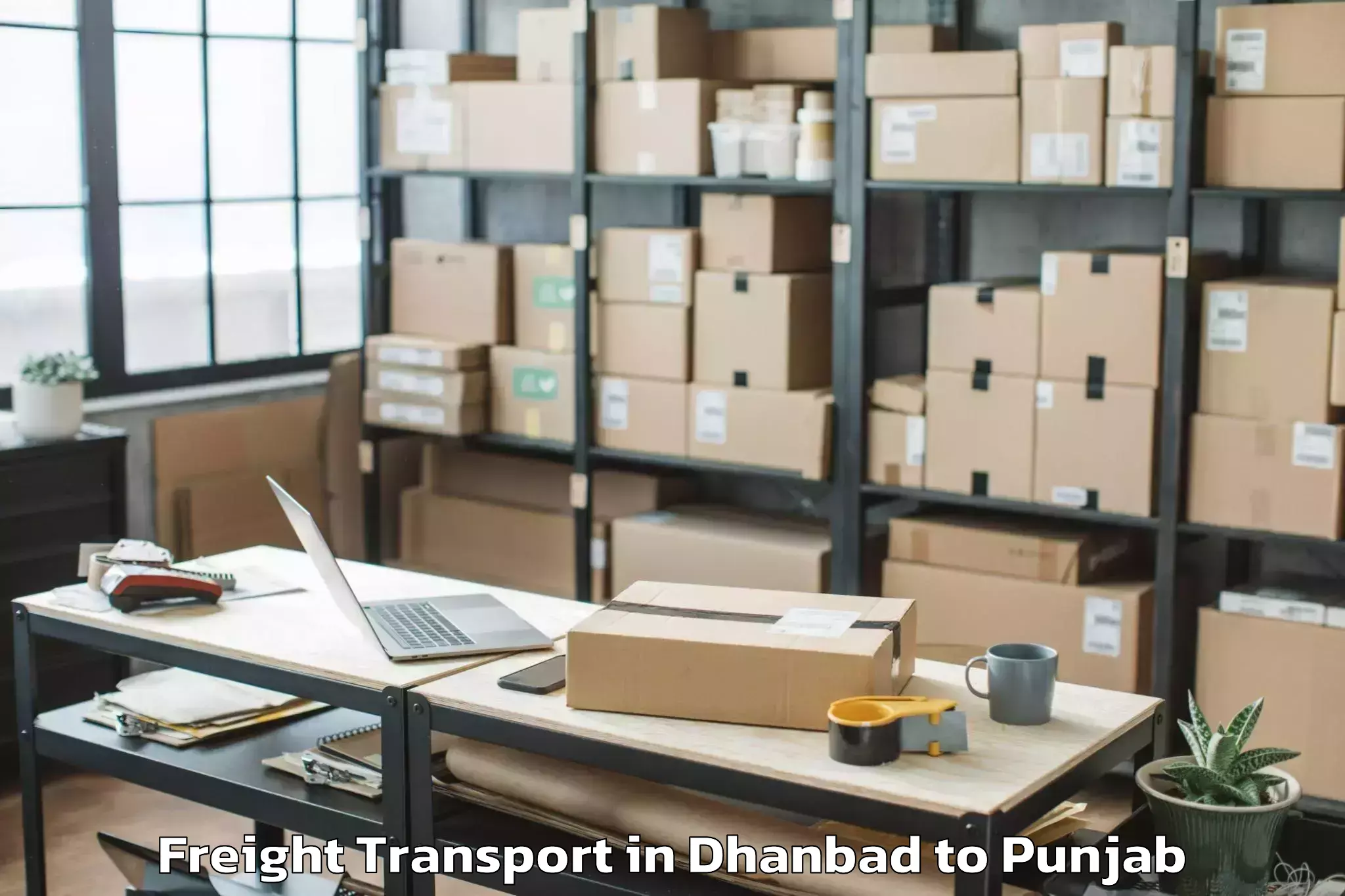 Get Dhanbad to Rajiv Gandhi National Universi Freight Transport